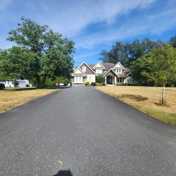 Magnificent 5000 sq ft Five Bedroom Single Family Home on Three Quarters of an Acre in Brookswood with Triple Garage
