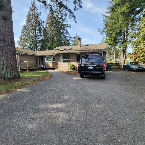 Spacious Four Bedroom Rancher in Brookswood on a Large Lot