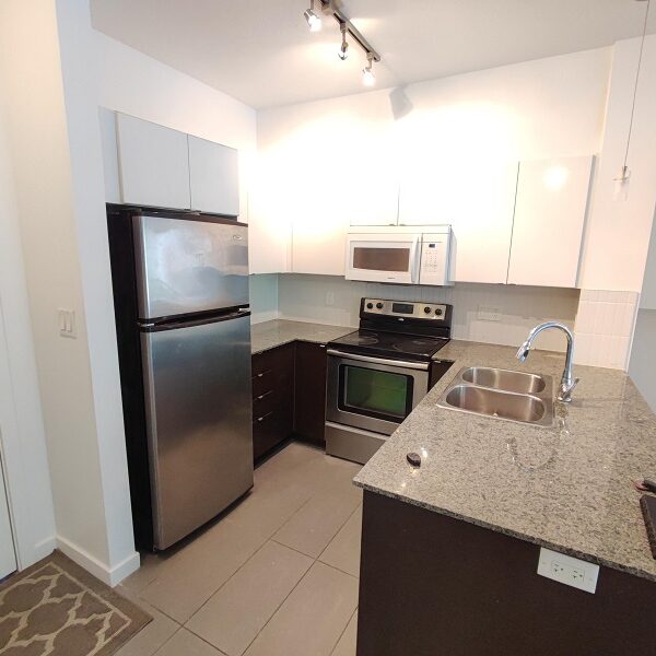 Quattro 1. Spacious Two Bedroom with Parking and Storage