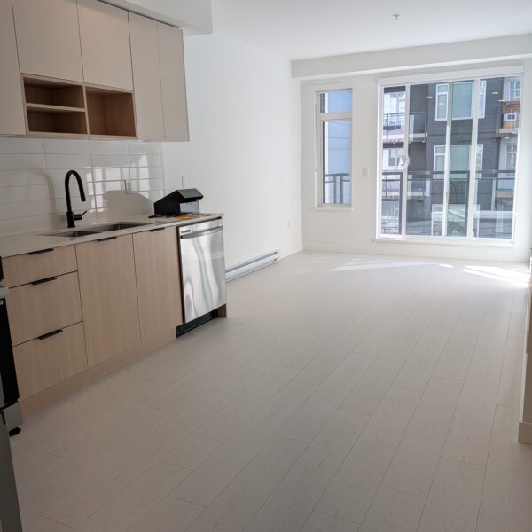 One Bedroom and Den with Parking and Storage in Convenient Surrey Central